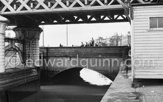 The River Liffey, the Loop Line railroad Bridge above and just behind it Butt Bridge. Dublin 1963. - Photo by Edward Quinn