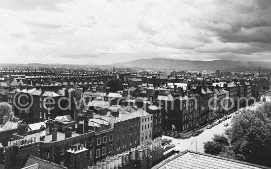 Looking South from Stephen\'s Green towards the sea and Dublin mountalns. Dublin 1963. Published in Quinn, Edward. James Joyces Dublin. Secker & Warburg, London 1974. - Photo by Edward Quinn