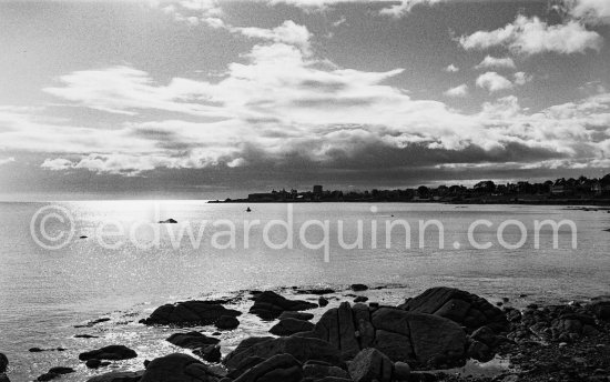 The sea near Dun Laoghaire (Kingstown) with the Martello Tower in the distanceDublin 1963. Published in Quinn, Edward. James Joyces Dublin. Secker & Warburg, London 1974. - Photo by Edward Quinn