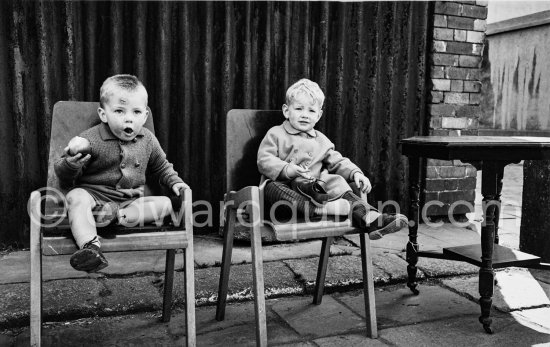 Boys at Anglesea Market, Dublin\'s secondhand market in a laneway off Moore Street. Dublin 1963. - Photo by Edward Quinn