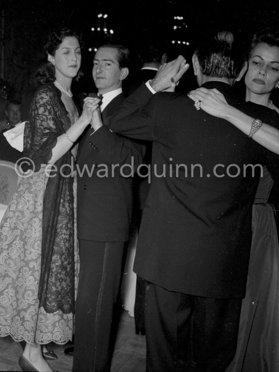 Ex-King Peter of Yugoslavia and his wife Alexandra (left). "Bal de la Rose" gala dinner at the International Sporting Club in Monte Carlo, 1956. - Photo by Edward Quinn