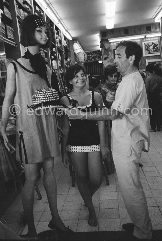 Charles Aznavour, shopping with his daughter Patricia at Saint-Tropez 1963. - Photo by Edward Quinn