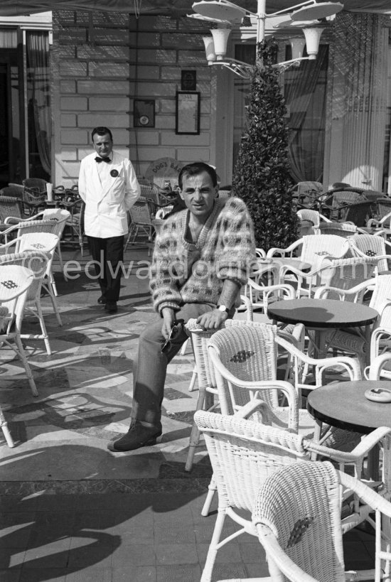 Charles Aznavour outside the Carlton Hotel Cannes 1959. - Photo by Edward Quinn