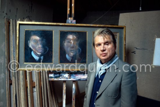 Francis Bacon is part of triptych with self-portraits at his Reece Mews studio in London 1980. - Photo by Edward Quinn