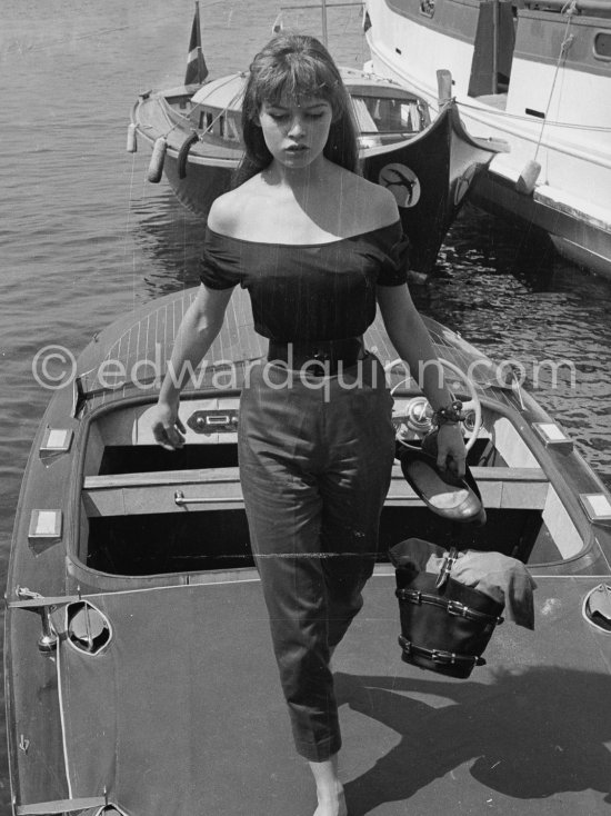 Brigitte Bardot on a boat. Cannes 1956. - Photo by Edward Quinn