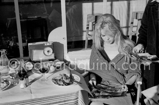 Brigitte Bardot during filming of Les bijoutiers du clair de lune" ("The Night Heaven Fell"). With a portable radio. Studios de la Victorine, Nice 1958. - Photo by Edward Quinn