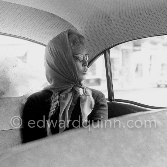 Brigitte Bardot slightly sulking. At the time of her honeymoon with Jacques Charrier. Saint-Tropez 1958. Car: 1957 Simca Vedette. - Photo by Edward Quinn