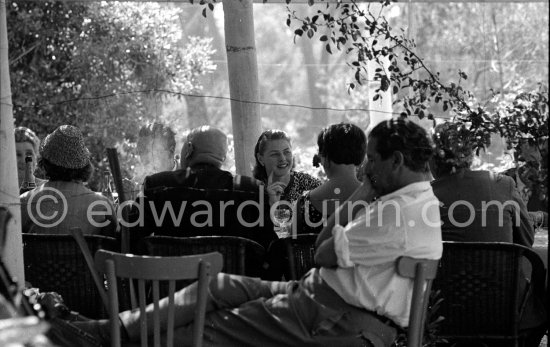Ingrid Bergman at lunch. On the left the Cannes Festival founder and president Robert Favre Le Bret. Cannes 1956. - Photo by Edward Quinn