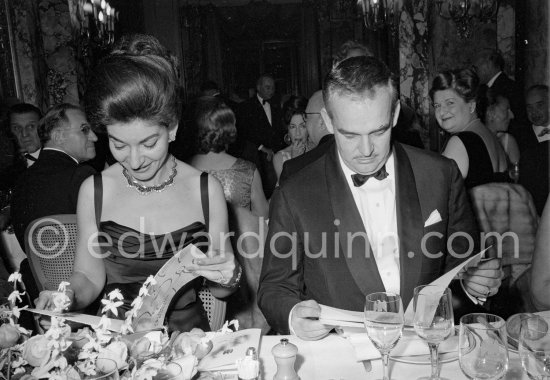 Maria Callas and Prince Rainier of Monaco at the "Gala des Rois", a charity gala for refugees organized by Prince Sadruddin Khan, studying the program, designed by Jean Cocteau. Hotel de Paris, Monaco 1963. - Photo by Edward Quinn