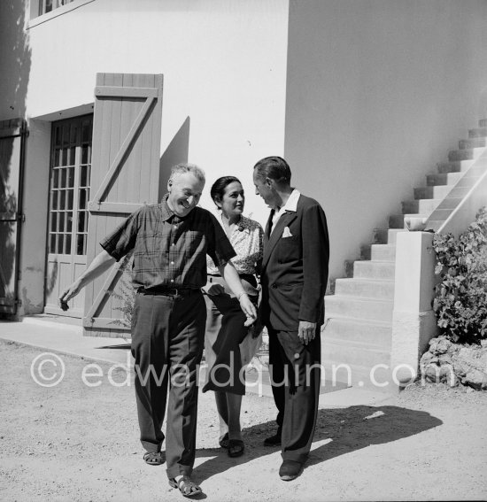 A buoyant Marc Chagall with his second wife, Valentine "Vava" Brodsky and Carleton Smith, editor of Esquire and European correspondent for the New York Herald Tribune. Saint-Paul-de-Vence 1953. - Photo by Edward Quinn