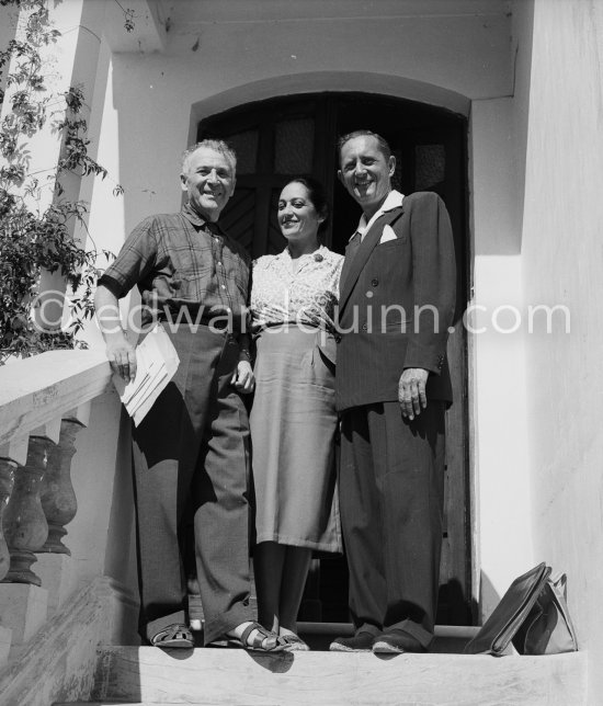 Marc Chagall with his second wife, Valentine "Vava" Brodsky and Carleton Smith, editor of Esquire and European correspondent for the New York Herald Tribune. Saint-Paul-de-Vence 1953. - Photo by Edward Quinn