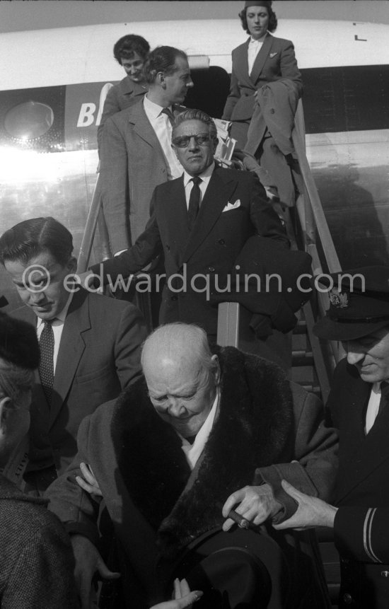 Sir Winston Churchill, Aristotle Onassis, Montague Brown, (Churchill’s secretary). Arrival at Nice Airport 1961. - Photo by Edward Quinn