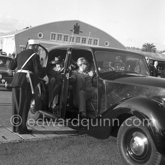 Sir Winston Churchill, Emery Reves (Churchill’s U.S. publisher) and his wife Wendy Russell Reves. Arrival at airport 1956. Car: 1948/49 Rolls-Royce Silver Wraith, #WZB29, Touring Limousine by Park Ward. Owner Emery Reves (Churchill’s U.S. publisher). Detailed info on this car by expert Klaus-Josef Rossfeldt see About/Additional Infos. - Photo by Edward Quinn