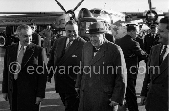 Winston Churchill arriving at Nice Airport 1958. Far left Emery Reves. - Photo by Edward Quinn