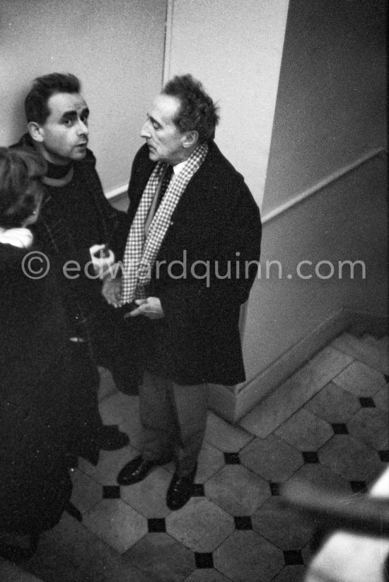 Henri-Georges Clouzot, Jean Cocteau. Attending a private viewing of Pablo Picasso\'s book illustrations in the Matarasso gallery in Nice. "Pablo Picasso. Un Demi-Siècle de Livres Illustrés". Galerie H. Matarasso. December 21 - January 31. Nice 1956. - Photo by Edward Quinn