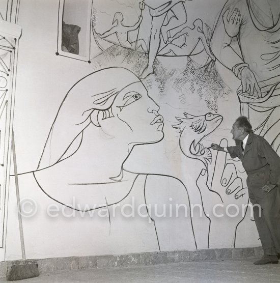 Jean Cocteau working on the mural of the Chapelle Saint Pierre. Villefranche-sur-Mer 1956. - Photo by Edward Quinn