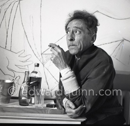 Jean Cocteau at Villa Santo Sospir of his close friend Francine Weisweiller in front of one of the murals he made for the interior walls. Saint-Jean-Cap-Ferrat 1954. - Photo by Edward Quinn