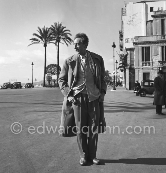 Jean Cocteau, Cocteau vernissage at Galerie des Ponchettes, walking along Promenade des Anglais. Nice 1953. - Photo by Edward Quinn