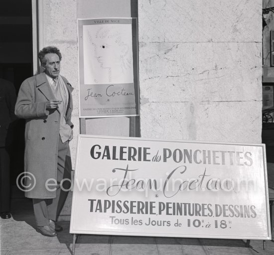 Jean Cocteau in the Galerie des Ponchettes, Nice where there is an exhibition of his paintings. 10th February 1953. - Photo by Edward Quinn