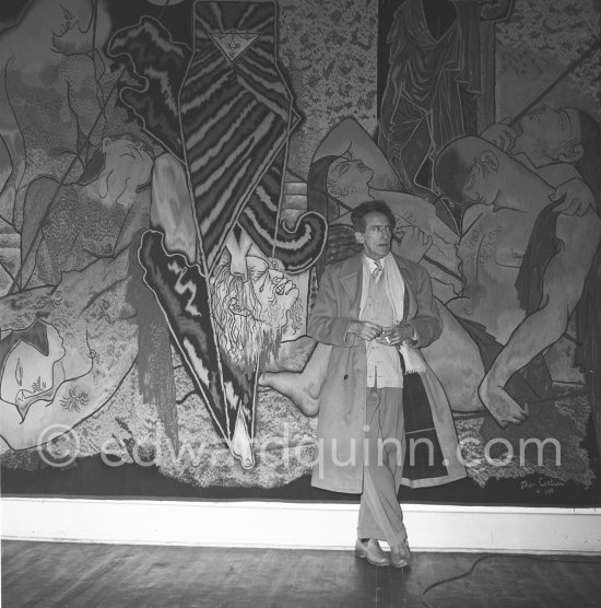Jean Cocteau in the Galerie des Ponchettes, Nice where there is an exhibition of his paintings. 10th February 1953. - Photo by Edward Quinn