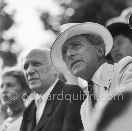 Jean Cocteau and Pablo Picasso attending a bullfight. Francine Weisweiller in the background. Vallauris, August 1956. - Photo by Edward Quinn