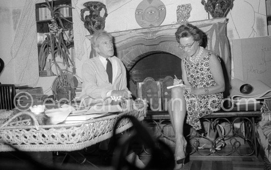 Jean Cocteau at Villa Santo Sospir interviewed by a local journalist. Saint-Jean-Cap-Ferrat 1959. - Photo by Edward Quinn