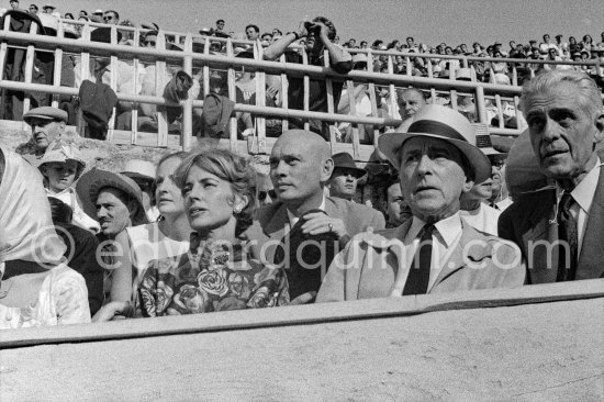 Jean Cocteau and Francine Weisweiller at a bullfight. Yul Brynner and his wife Doris behind them. Person at right not yet identified. Arles 1960. - Photo by Edward Quinn