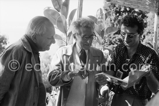 Alberto Magnelli, Cocteau, photographer Lucien Clergue. During filming of "Le Testament d’Orphée", film of Jean Cocteau. Saint-Jean-Cap-Ferrat 1959. - Photo by Edward Quinn