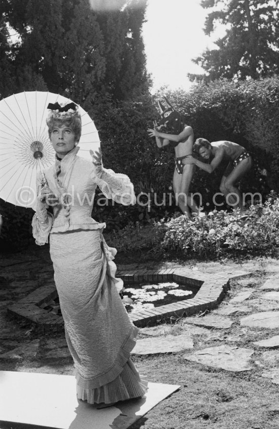 Francine Weisweiller and "L\'homme chien" (Guy Dute and Jean-Claude Petit). During filming of "Le Testament d’Orphée", film of Jean Cocteau. Saint-Jean-Cap-Ferrat 1959. - Photo by Edward Quinn