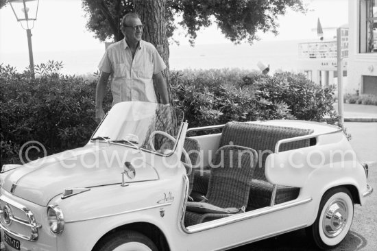 Gary Cooper\'s long legs fit well into the beach buggy of English millionaire James Hanson. Eden Roc, Cap d’Antibes 1959. Car: 1959 Fiat 600 Jolly. - Photo by Edward Quinn