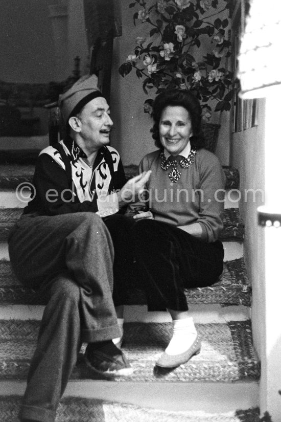 Encouraging Salvador Dalí in his work is his Russian born wife Gala to whom submits all his work for her critic or approval. At Salvador Dalí\'s house, Port Lligat, Cadaques 1957. Encouraging Salvador Dalí in his work is his Russian born wife Gala to whom he submits all his work for her critic or approval. At Salvador Dalí\'s house, Portlligat, Cadaqués, 1957. - Photo by Edward Quinn
