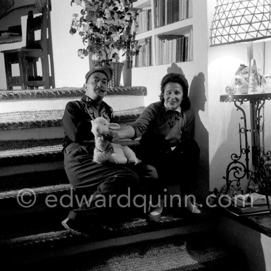 Spanish-Catalan painter Salvador Dalí with a stuffed toy lamb and his Russian-born wife Gala. Salvador Dalí was known to submit all his work for Gala’s approval. At Salvador Dalí’s house, Portlligat, Cadaqués, 1957. - Photo by Edward Quinn