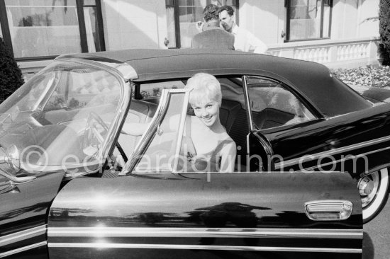Mylène Demongeot. Cannes 1957. Car: Chrysler New Yorker 1957 Sport Convertible - Photo by Edward Quinn