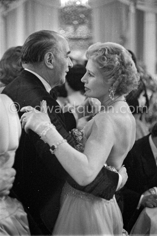 Sir Bernard Docker (Daimler car boss) and Lady Docker. "Bal de la Rose" gala dinner at the International Sporting Club in Monte Carlo, 1956. - Photo by Edward Quinn