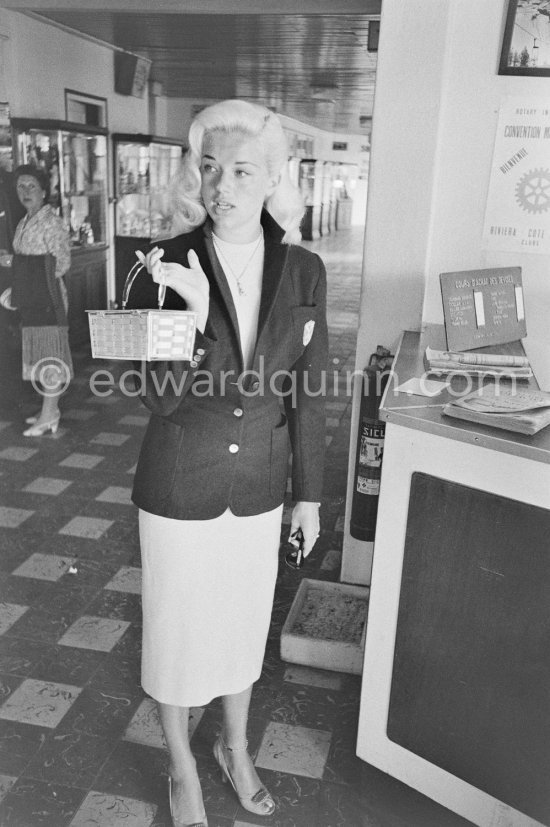Diana Dors at Nice Airport 1957. - Photo by Edward Quinn