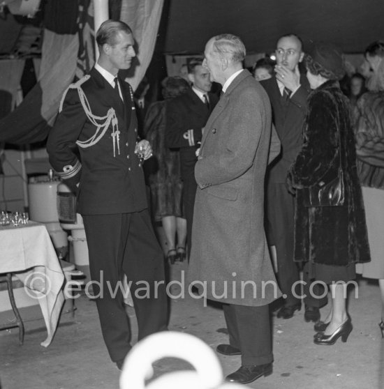 A reception on HMS Magpie. The Duke of Edinburgh, Prince Philip, on an official 5-days visit with the Royal Fleet to Monte Carlo, Feb. 1951. The ship was the only vessel commanded by Prince Philip, Duke of Edinburgh, who took command on 2 September 1950, when he was 29. - Photo by Edward Quinn