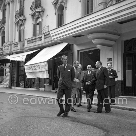 The Duke of Edinburgh, Prince Philip, on an official 5-days visit with the Royal Fleet to the Côte d\'Azur. Here he is with members of the The Royal British Legion Nice-Monaco Branch, in front of Monte Carlo Palace 1951. - Photo by Edward Quinn