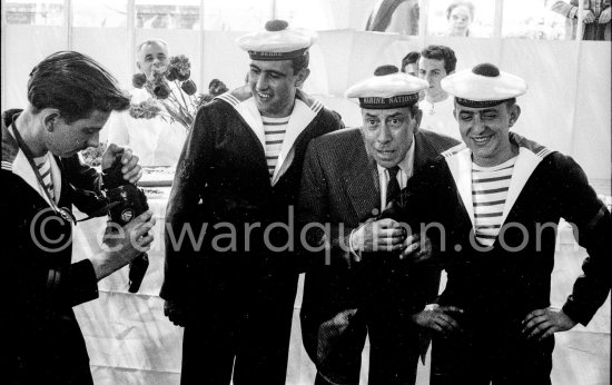 Fernandel joking around with sailors of the "Marine nationale". Cannes 1956. - Photo by Edward Quinn