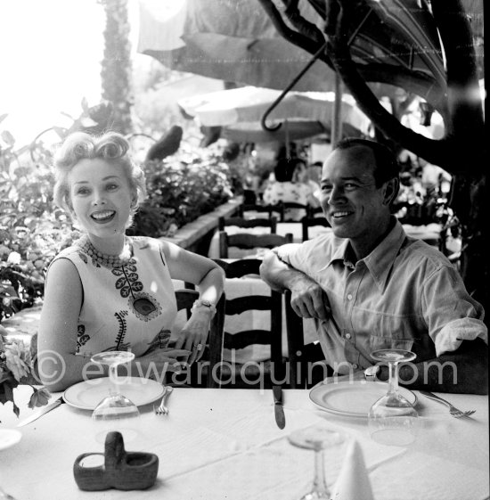 Zsa Zsa Gabor and Earl Blackwell, a society impresario who made his fortune keeping track of celebrities, at the restaurant Colombe d\'Or, Saint-Paul-de-Vence 1953. - Photo by Edward Quinn