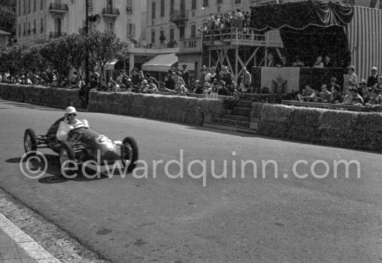 Stirling Moss, (22) Cooper Jap. Winner of the "The Prix de Monte-Carlo". The Prince\'s tribune with Prince Rainier in the background. Formula 3 Grand Prix, called "The Prix de Monte-Carlo". Monaco 1950. - Photo by Edward Quinn