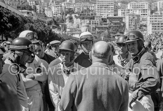 Driver\'s briefing, from left: Fangio, hidden Harry Schell, Peter Collins, Wolfgang von Trips, Jack Brabham, Mike Hawthorn. Monaco Grand Prix 1957. - Photo by Edward Quinn