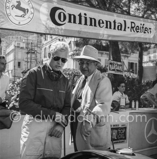 Mike Hawthorn and Tony Vandervell, head of the Vanwall Formula One racing team. Monaco Grand Prix 1957. - Photo by Edward Quinn
