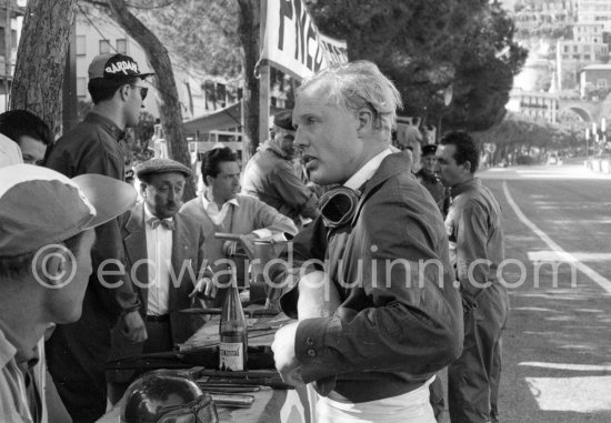 Mike Hawthorn who was noted for wearing a bow tie and a white shirt when racing. Monaco Grand Prix 1957. - Photo by Edward Quinn