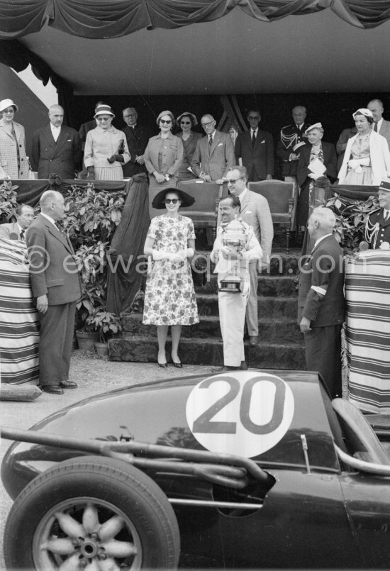 Princess Grace and Prince Rainier. Maurice Trintignant, (20) Cooper T45, the race\'s winner. Monaco Grand Prix 1958. - Photo by Edward Quinn