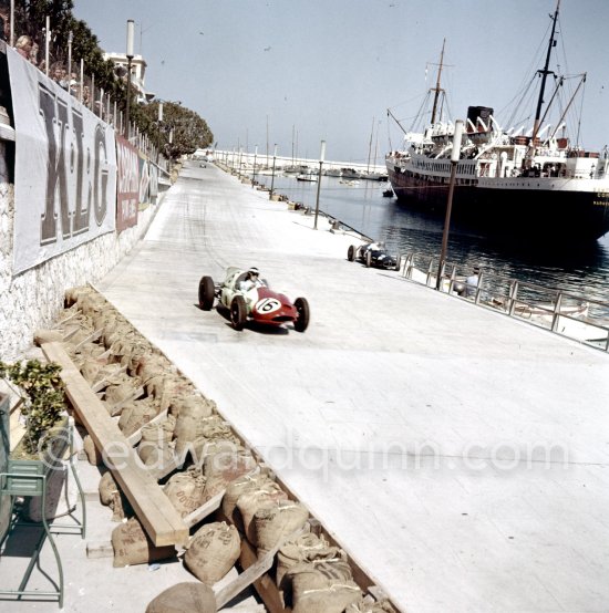 Chris Bristow, (16) Cooper T51, on right Joakim Bonnier\'s N° 2 B.R.M. P48. Monaco Grand Prix 1960. - Photo by Edward Quinn