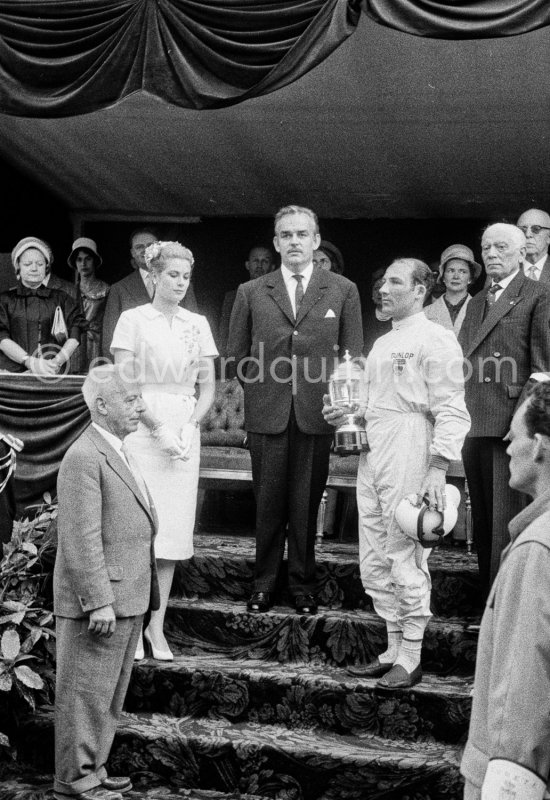 Winner of the race Stirling Moss at the Prince\'s tribune for the prize-giving by Princess Grace and Prince Rainier, as the British national anthem is played, Monaco Grand Prix 1960. - Photo by Edward Quinn