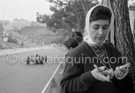 Bette Hill, wife of Graham Hill, armed with stop watches. Monaco Grand Prix 1962. - Photo by Edward Quinn