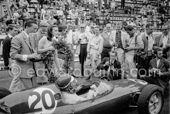 An American film company making the film "Love is a Ball" took advantage of the race to shoot some scenes during practice. French actress Béatrice Altariba and actor Glenn Ford who plays a retired racing driver in the cockpit of Trevor Taylor\'s Lotus-Climax. Monaco Grand Prix 1962. - Photo by Edward Quinn