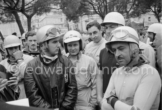 Driver briefing by Louis Chiron. From left: Trevor Taylor, Jack Brabham, Graham Hill, Willy Mairesse, Bruce McLaren, Roy Salvadori, Joakim Bonnier, Maurice Trintignant, Phil Hill. Monaco Grand Prix 1962. - Photo by Edward Quinn