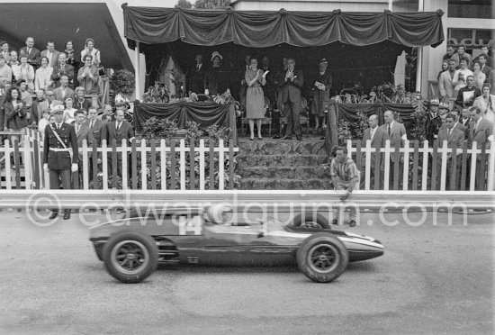 Bruce McLaren, (14) Cooper T60, winner of the race, in front of the Prince\'s tribune with Princess Grace and Prince Rainier. Monaco Grand Prix 1962. - Photo by Edward Quinn